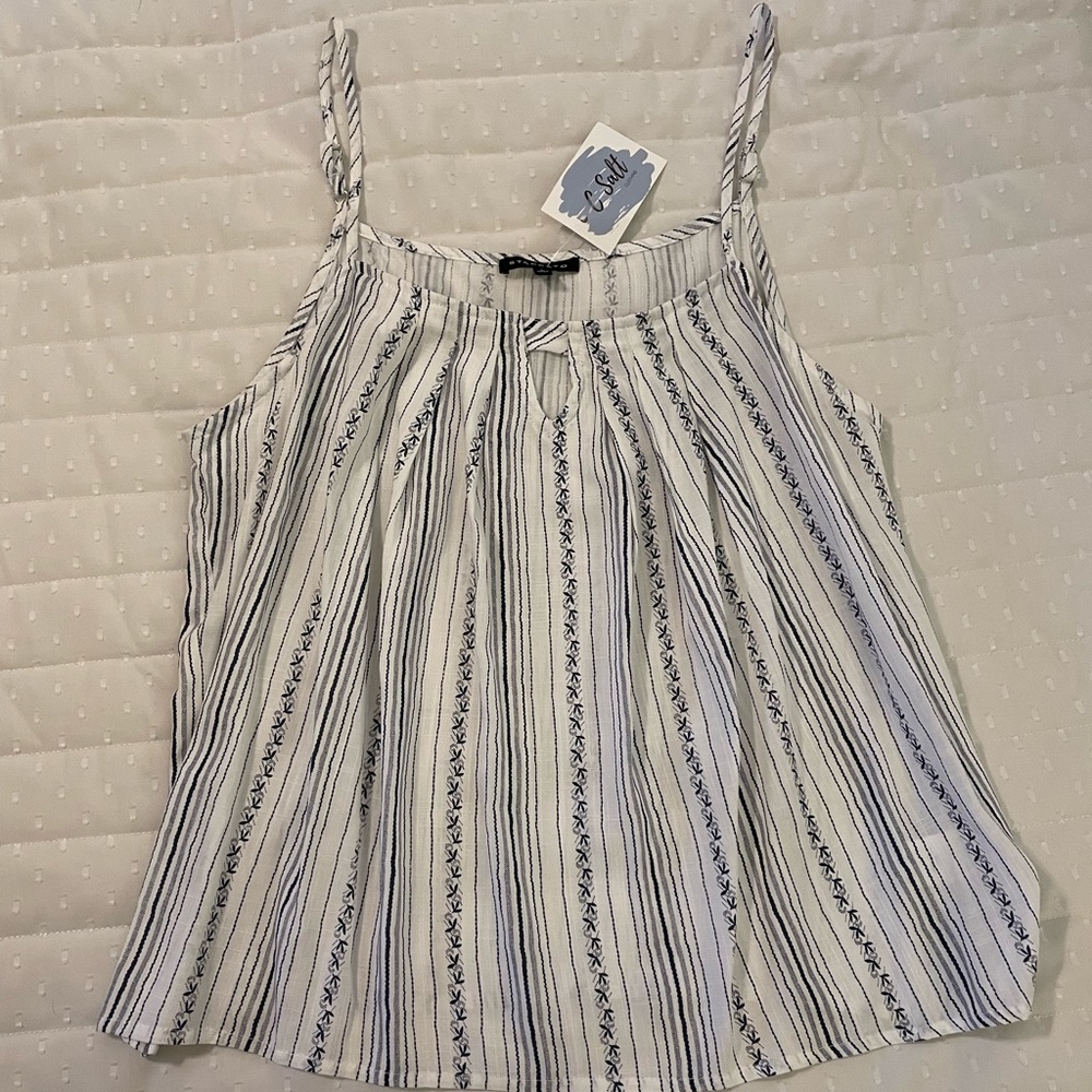 NWT cute flowy tank with keyhole detail neckline.